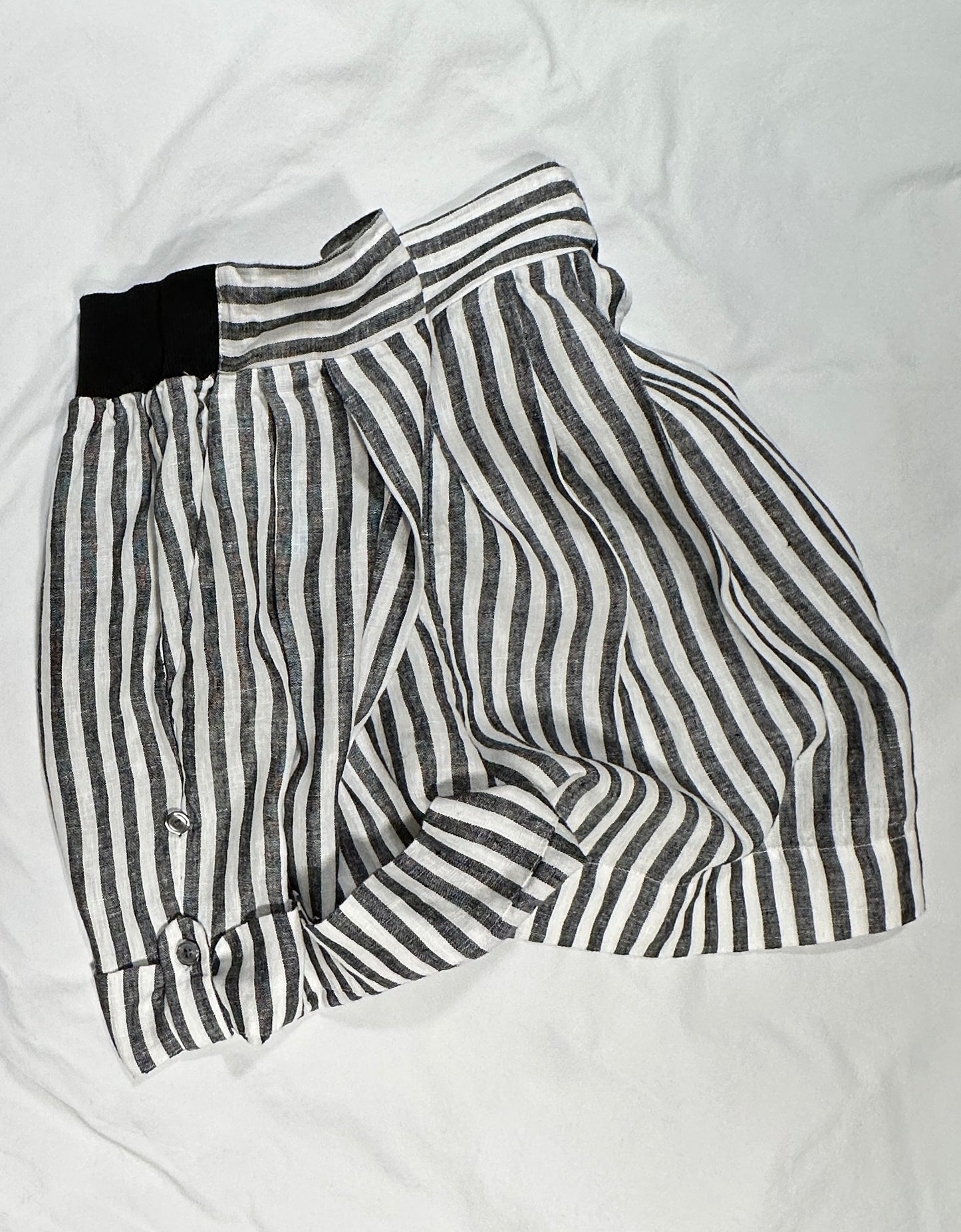 Adjustable length pull on shorts.