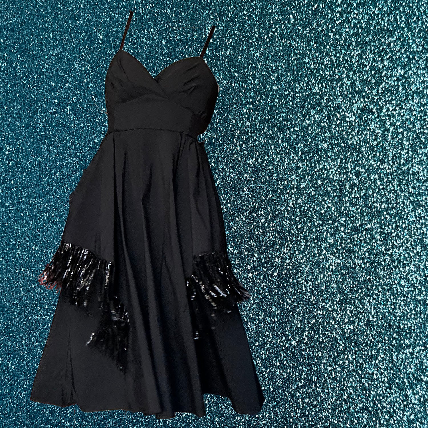 black dress with sequin fringe on sequin background